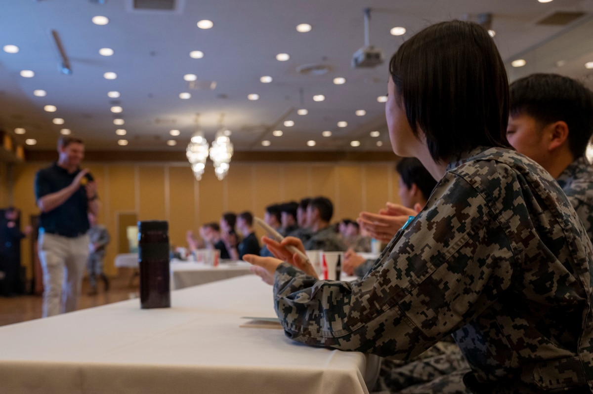 A Japan Air Self-Defense Force Airman attends the F-35 Emergency Response Symposium at Misawa Air Base, Japan, Feb. 21, 2024.