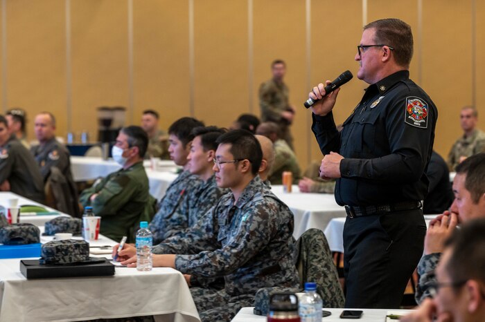 Mr. Jeff Herriot, 775th Civil Engineer Squadron deputy fire chief, presents slides for an F-35 Emergency Response Symposium at Misawa Air Base, Japan, Feb. 22, 2024.