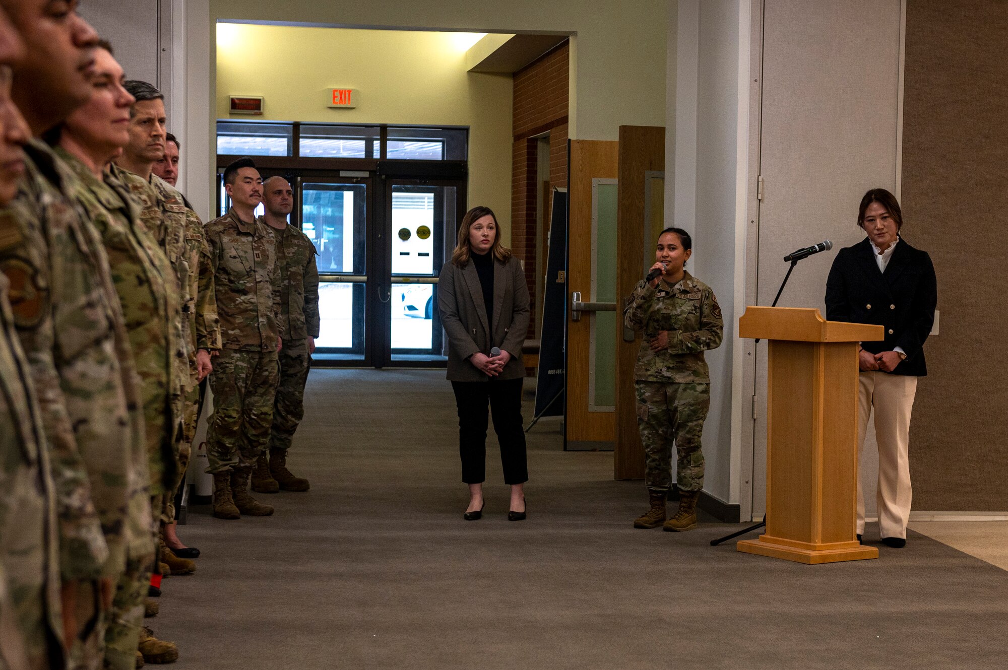 U.S. Air Force Staff Sgt. Rochelle Sampaga, 51st Comptroller Squadron resource advisor, sings the Korean national anthem at the Osan Air Base Chapel Grand Opening Ceremony at Osan AB, Republic of Korea, Feb. 29, 2024. Construction of the new chapel began three years ago. The new chapel commits to maintaining its service to Airmen for the next 50 years, demonstrating an investment in Osan today for the Airmen of tomorrow. (U.S. Air Force photo by Senior Airman Kaitlin Castillo)