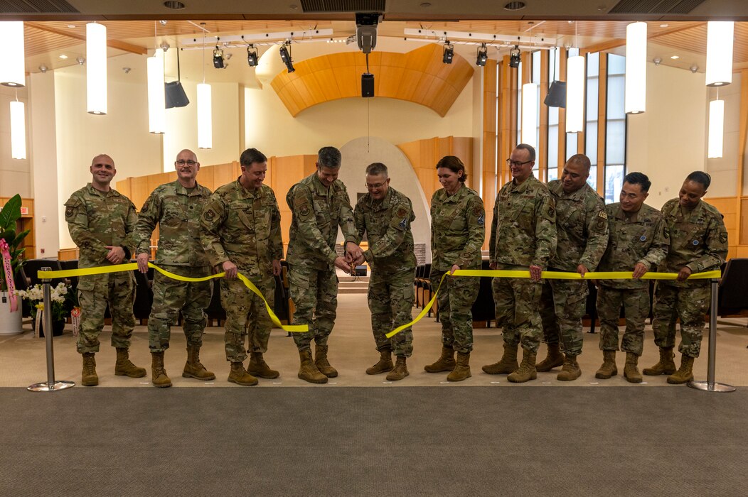 U.S. Air Force Maj. Gen. Randall Kitchens, Department of the Air Force chief of chaplains, cuts the ribbon with Col. William McKibban, 51st Fighter Wing commander, during  the Osan Air Base Chapel Grand Opening Ceremony at Osan AB, Republic of Korea, Feb. 29, 2024. With the growing number of families and joint units on Osan AB, the new chapel was built to adequately support the growing population.The new chapel commits to maintaining its service to Airmen for the next 50 years, demonstrating an investment in Osan today for the Airmen of tomorrow.  (U.S. Air Force photo by Senior Airman Kaitlin Castillo)