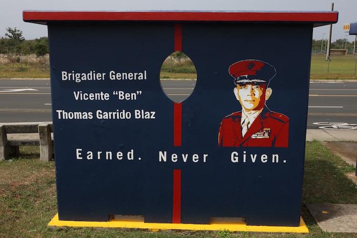 U.S. Marines with Marine Corps Base (MCB) Camp Blaz revisited a bus stop originally painted in 2021 to revitalize its color and design Dededo, Guam, Feb. 5, 2024. MCB Camp Blaz partnered with the Dededo Mayor’s Office to touch up the bus stop across from its current home on NCTS Guam as one of its island beautification Projects. Community service and volunteer events allow service members to build and foster relationships with the community while also giving back to it. (U.S. Marine Corps photo by LCpl. Ryan Little)