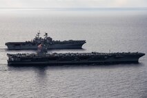 Ships from the Gerald R. Ford Carrier Strike Group (GRFCSG) and the Bataan Amphibious Ready Group (ARG), and Hellenic Navy frigate HS Navarinon (F 461) sail in formation in the Mediterranean Sea, Dec. 31, 2023. The ships from the GRFCSG include the first-in-class aircraft carrier USS Gerald R. Ford (CVN 78) and the Arleigh Burke-class guided-missile USS The Sullivans (DDG 68), USS Bulkeley (DDG 84), and USS Delbert D. Black (DDG 119). The ships from the Bataan ARG include the Wasp-class amphibious assault ship USS Bataan (LHD 5), the San Antonio Class-class amphibious transport dock USS Mesa Verde (LPD 19), Harpers Ferry-class dock landing ship USS Carter Hall (LSD 50). The U.S. maintains forward deployed, ready, and postured forces to deter aggression and support security and stability around the world. (U.S. Navy photo by Mass Communication Specialist 3rd Class Maxwell Orlosky)