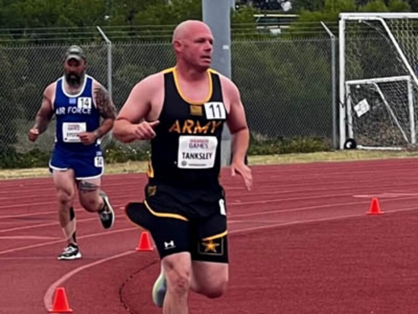 Photo By MaryTherese Griffin | (Photo by MaryTherese Griffin) Sgt. 1st Class Jeremy Tanksley running track for Team Army at the 2023 Department of Defense Warrior Games Challenge in San Diego, Calif June 2023.
