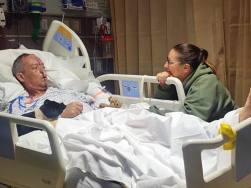 Courtesy Photo | (Photo courtesy Jeralyn Ditlevson) Maj. Jeremy Ditlevson with his wife Jeralyn in the ICU at OU Medical, Oklahoma City, OK, January 23, 2023.