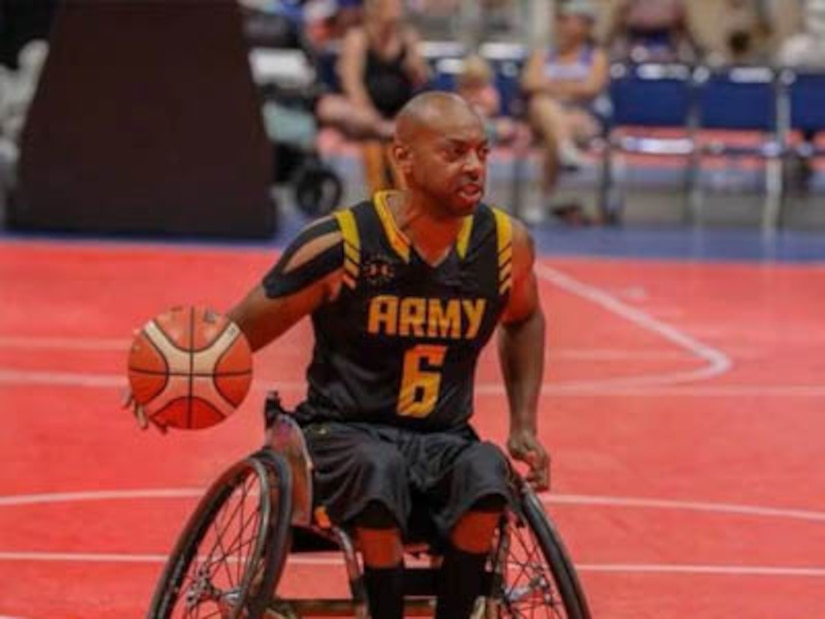 Courtesy Photo | (Photo by Pfc. Dominique Dixon) Spc. Brent Garlic of Team Army competes in wheelchair basketball at the 2019 Department of Defense Warrior Games in Tampa, Florida.