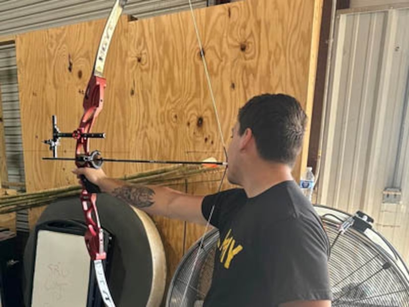 Courtesy Photo | (Photo by Marsha Moore) Sgt. Ethan Barrera shoots an arrow with this mouth at Adaptive Sports Camp at Ft. Liberty in April 2023
