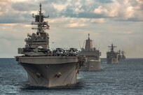 Ships from the Gerald R. Ford Carrier Strike Group (GRFCSG) and the Bataan Amphibious Ready Group (ARG), and Hellenic Navy frigate HS Navarinon (F 461) sail in formation in the Mediterranean Sea, Dec. 31, 2023. The ships from the GRFCSG include the first-in-class aircraft carrier USS Gerald R. Ford (CVN 78) and the Arleigh Burke-class guided-missile USS The Sullivans (DDG 68), USS Bulkeley (DDG 84), and USS Delbert D. Black (DDG 119). The ships from the Bataan ARG include the Wasp-class amphibious assault ship USS Bataan (LHD 5), the San Antonio-class amphibious transport dock USS Mesa Verde (LPD 19), and the Harpers Ferry-class dock landing ship USS Carter Hall (LSD 50). The U.S. maintains forward deployed, ready, and postured forces to deter aggression and support security and stability around the world. (U.S. Navy photo by Mass Communication Specialist 2nd Class Nolan Pennington)