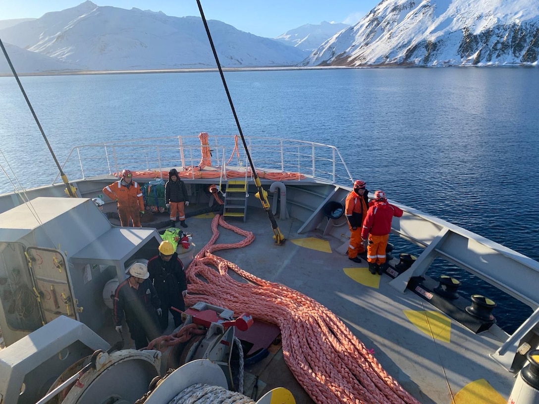 Response personnel stage the Emergency Towing System aboard M/V Genius Star XI while offshore Unalaska, Alaska, Dec. 31, 2023. The M/V Genius Star XI remains stable. Assessment teams on site report air quality remains normal, and there is no indication of heat in or around the cargo holds. Courtesy photo.