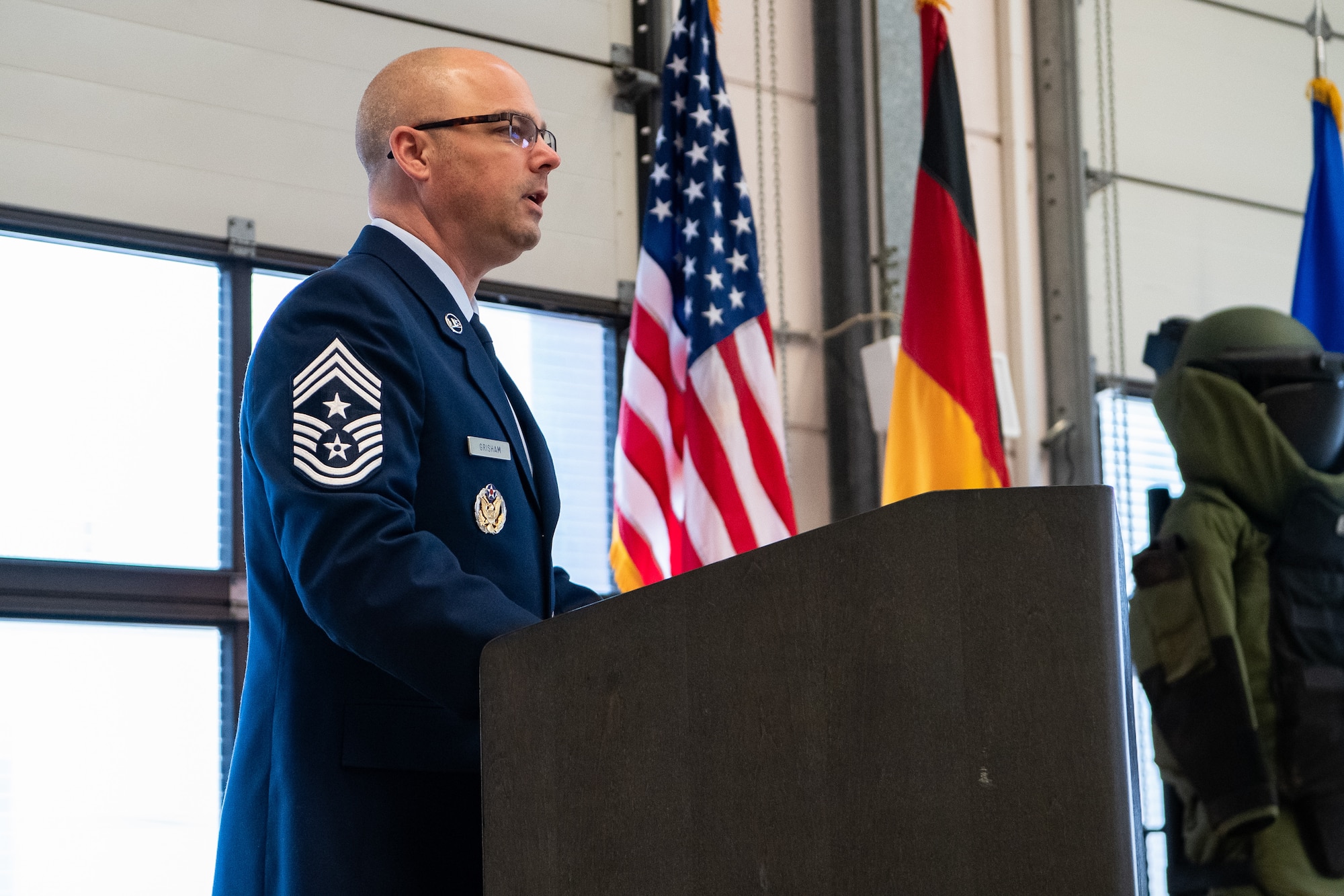 A display committed to the memory of U.S. Air Force Staff Sgt. Joseph J. Hamski greets visitors entering the 52nd Civil Engineer Squadron Explosive Ordnance Disposal flight facility at Spangdahlem Air Base, Germany, Dec. 1, 2023. The facility is dedicated to Hamski, an EOD technician who was assigned to Spangdahlem AB when he was killed in action in May 2011. (U.S. Air Force photo by Staff Sgt. Max J. Daigle)