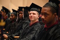 Cadets of the Capital Guardian Youth Challenge Academy Class 61 receive their diplomas upon completion of a 22 week long “quasi-military" course, during a residential phase commencement ceremony at the University of the District of Columbia, Dec. 29, 2023. Since 2013, the mission of the program is to intervene in and reclaim the lives of at-risk youth, and produce program graduates with the values, skills, education, and self-discipline necessary to succeed as adults.