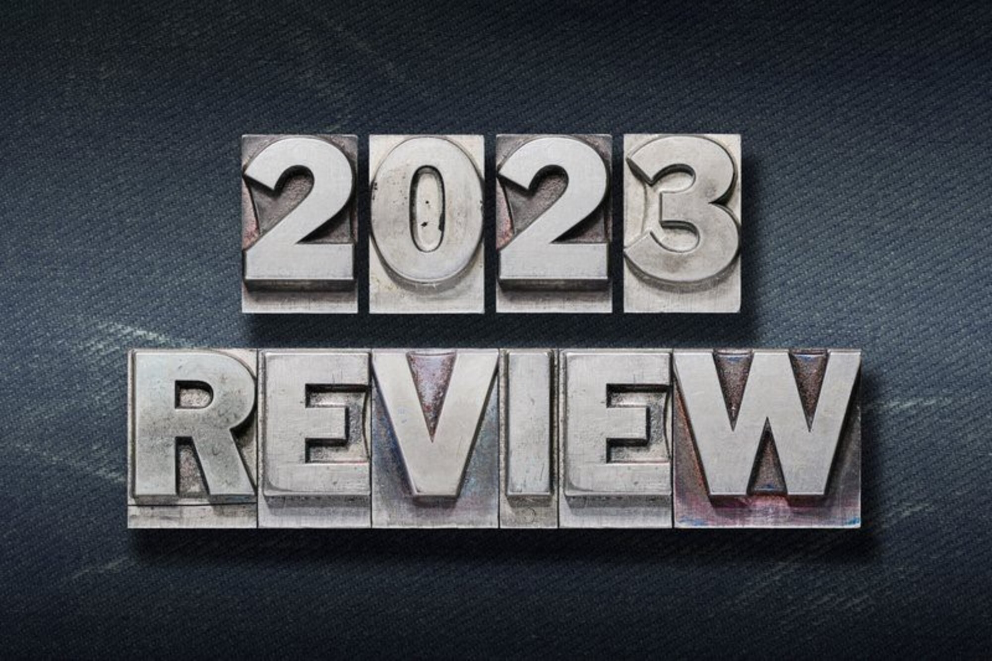 2023 REVIEW printed out in lead printers type