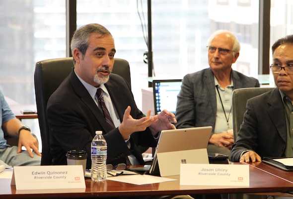 Jason Uhley, left, general manager of the Riverside County Flood Control and Water Conservation District, participates in a discussion Nov. 30 during the 2023 Seven County Flood-Control Directors Meeting at the Corps’ LA District headquarters in downtown LA.