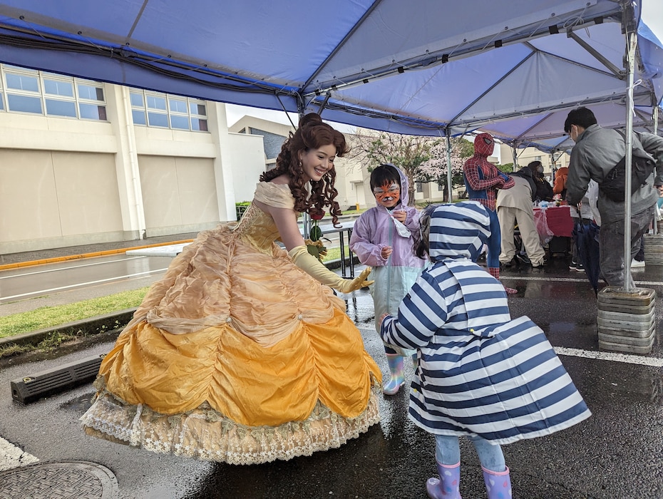 Princess Belle greets children at Commander, Fleet Activities Yokosuka (CFAY) during the 27th annual Spring Festival celebration in Yokosuka, Japan.