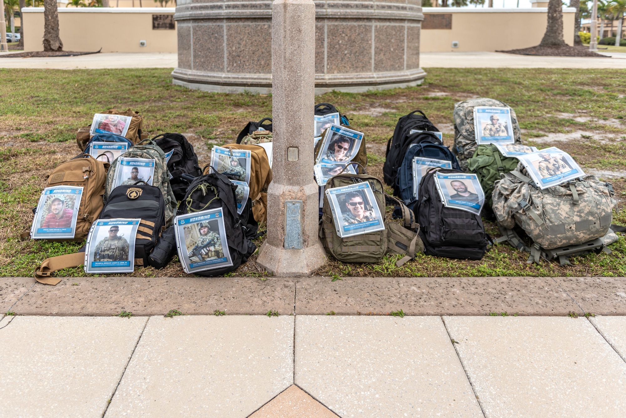 Members of the Air Force Office of Special Investigation Detachment 802 and 45th Security Forces Squadron gathered for a ruck march in memory of joint patrol team Hustler 6 at Patrick Space Force Base, Florida, Dec. 21, 2023.