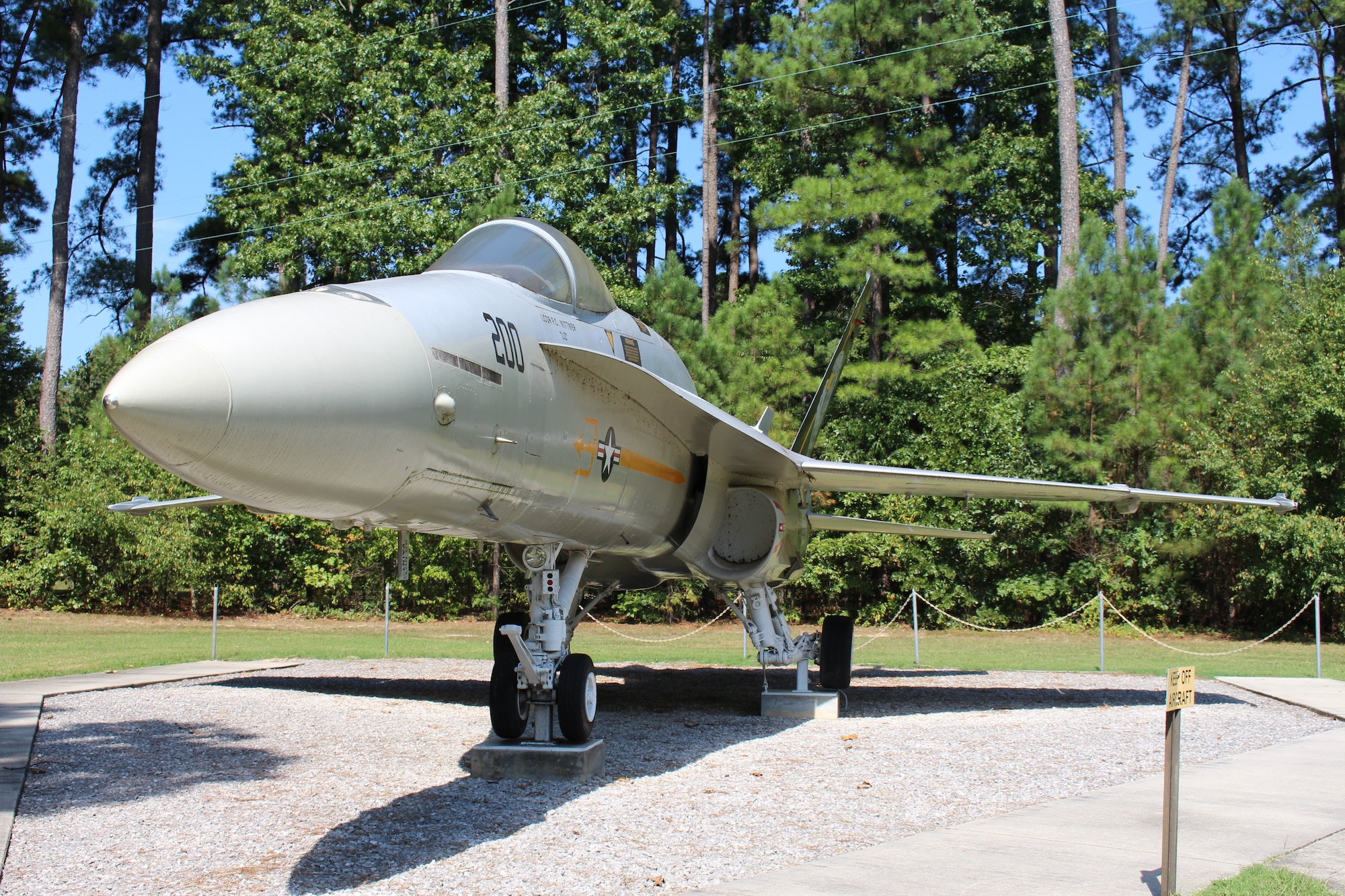 The static F/A-18 Hornet on display outside Gate 2 at Arnold Air Force Base, Tenn., is dedicated to Navy Lt. Cmdr. Frank Wittwer. He died Jan. 18, 2006, in a crash caused by aircraft mechanical failure during a nighttime training mission over California. He was preparing for deployment overseas. Wittwer was a 1994 graduate of the U.S. Naval Academy. He earned his undergraduate degree in systems engineering prior to beginning his active-duty career. (U.S. Air Force photo by Kali Bradford)