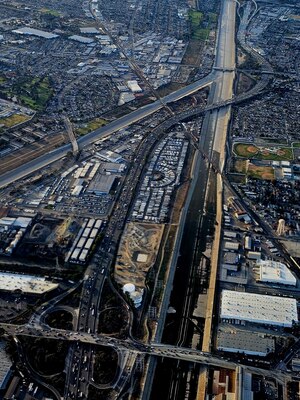 Pictured is an aerial view of portions of the Los Angeles River. The U.S. Army Corps of Engineers Los Angeles District has several roles in operating, maintaining and regulating the LA River, as well as managing federal lands. Under the Los Angeles County Drainage Area project, the Corps operates and maintains several dams and portions of the river's channels and tributaries. The river flows through seven different congressional districts, 10 city council districts, 20 neighborhood councils and 12 community-planned areas.