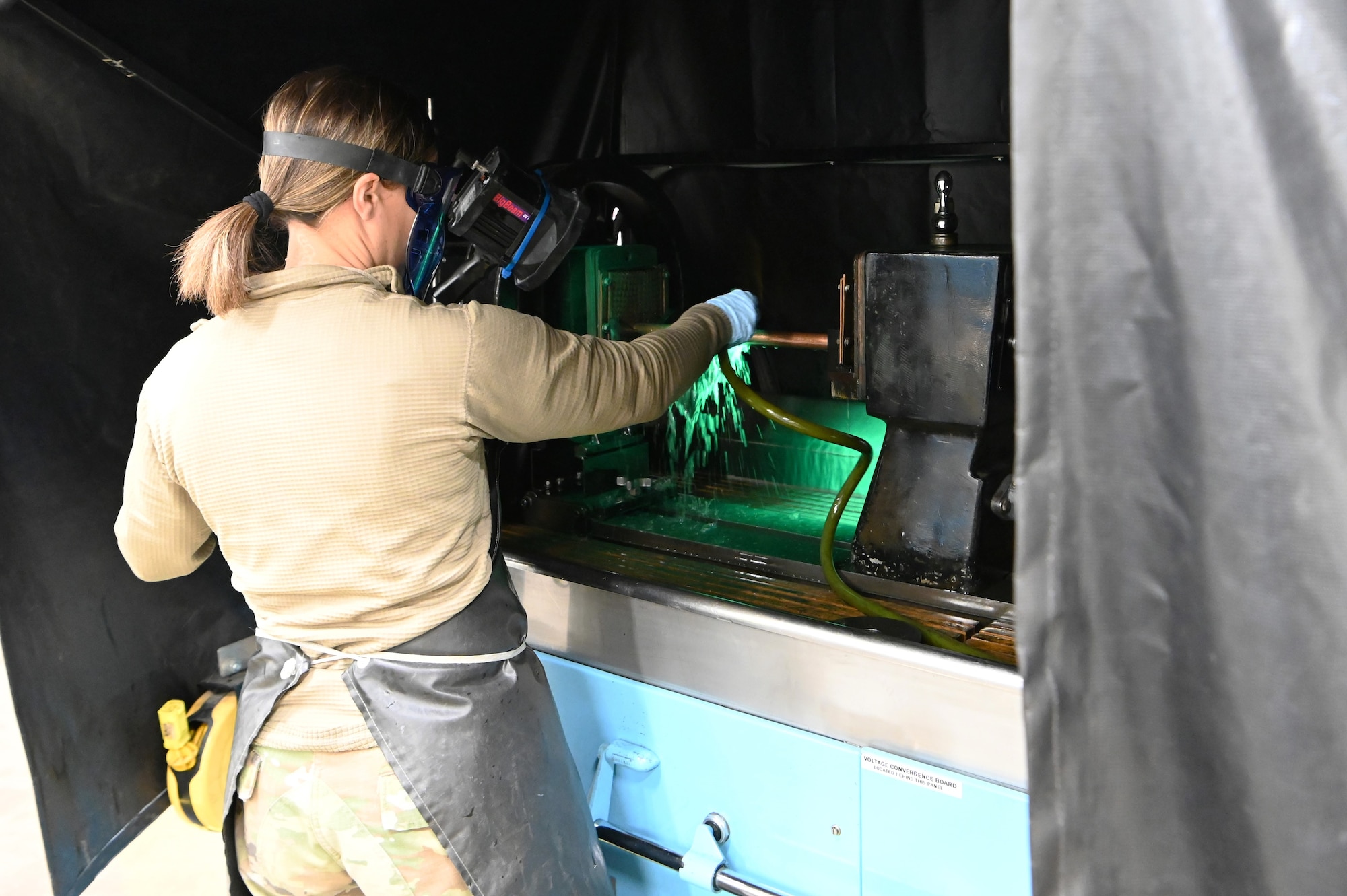 Airmen 1st Class Kellie Marshall, a traditional Guardsman with the 173rd Fighter Wing, conducts a magnetic particle inspection.