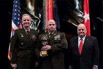 U.S. Army Lt. Gen. Walter E. Piatt, the Director of the Army Staff and U.S. Army Captain (Retired) Timothy J. Lockhart, General Douglas MacArthur Foundation Board of Directors presents the MacArthur award to Cpt. Richard J. Payne of the West Virginia Army National Guard during the 36th Annual General Douglas MacArthur Leadership award ceremony at Conmy Hall, Joint Base Myer-Henderson Hall, Va., November 15, 2023. (U.S. Army photo by Mr. Leroy Council)
