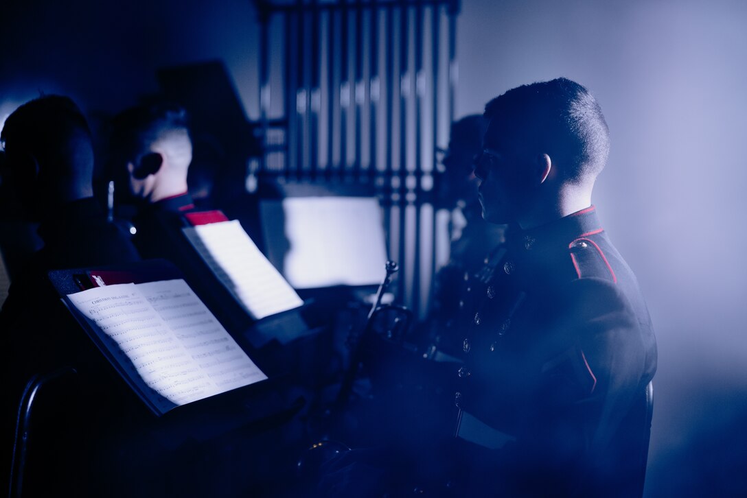 U.S. Marine Corps Lance Cpl. Bryce Trollinger, a trumpeter with III Marine Expeditionary Force Band, watches the conductor for cues during the III MEF Band’s Holiday Concert on Camp Foster, Okinawa, Japan, Dec. 15, 2023. The band’s Holiday Concert Series was a free, two-day event that featured popular songs: Santa Baby, Let it Snow, Sleigh, Ride, and Santa Claus is Coming to Town. Trollinger, is a native of Sainte Genevieve, Miss. (U.S. Marine Corps photo by Cpl. Thomas Sheng)