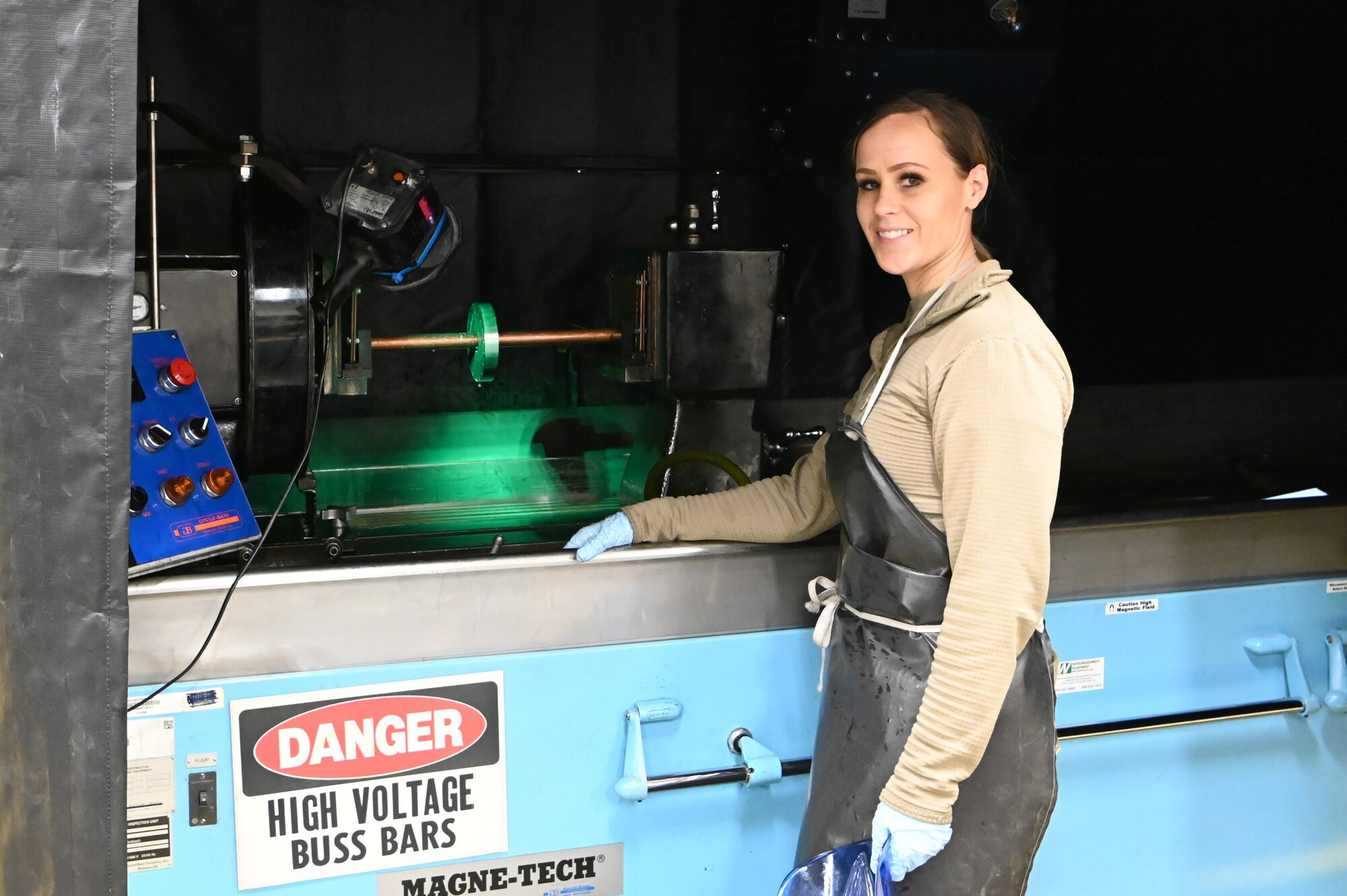 U.S. Air Force Airman 1st Class Kellie Marshall, a traditional Guardsman with the 173rd Fighter Wing, prepares to conduct a magnetic particle inspection Dec. 15, 2023, at Kingsley Field in Klamath Falls, Oregon. The inspection finds cracks in material preventing potential part failure and aircraft mishaps.