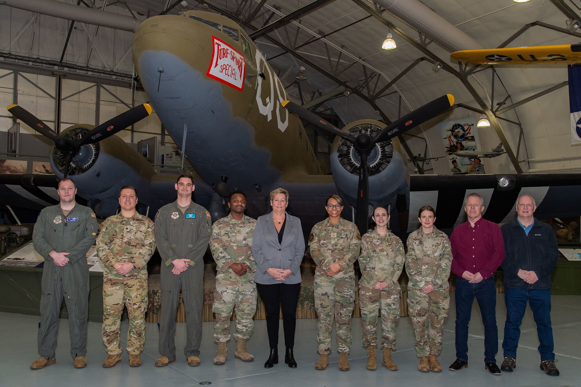 Members of the 436th Airlift Wing Safety Office, left to right are U.S. Air Force Majs. Jordan Ward, Joe Stephenson and Capt. Matthew Bohannon, all flight safety officers; U.S. Air Force Master Sgt. Jerrel Futrell, safety superintendent and flight safety noncommissioned officer in charge; Lorie Bellamy, occupational safety manager; U.S. Air Force Master Sgt. Brittany Nowell, occupational safety noncommissioned officer in charge; U.S. Air Force Tech. Sgt. Bryanna Dahl, occupational safety craftsman; U.S. Air Force Staff Sgt. Rebekah Busch, occupational safety apprentice; Tim Hahn, occupational safety specialist and Robert Brown, weapons safety manager, pose for a group photo inside the Air Mobility Command Museum at Dover Air Force Base, Delaware, Jan. 3, 2024. The safety office earned the AMC Safety Outstanding Achievement Award, Category II for fiscal year 2023. (U.S. Air Force photo by Roland Balik)