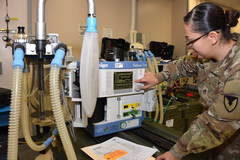 Staff Sgt. Nora Martinez, maintenance chief of operations at the U.S. Army Medical Materiel Agency’s Medical Maintenance Operations Division at Hill Air Force Base, Utah, inspects an anesthesia machine Nov. 14, 2023. (C.J. Lovelace)