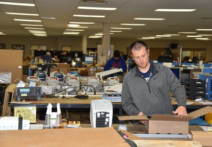 Daniel Nightingale, a contract biomedical equipment technician and Army Reserve sergeant, works inside the shop at the U.S. Army Medical Materiel Agency’s Medical Maintenance Operations Division at Hill Air Force Base, Utah, Nov. 14, 2023. (C.J. Lovelace)