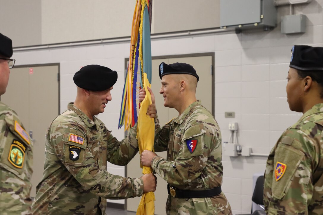 Col. J.B. Richmond relinquished command of the 149th Maneuver Enhancement Brigade to incoming Commander, Col. Brandye Williams during a ceremony held on December 2, 2023 at the Richmond, Ky. armory. (U.S. Army National Guard photo by Sgt. Joy Himmelsbach)