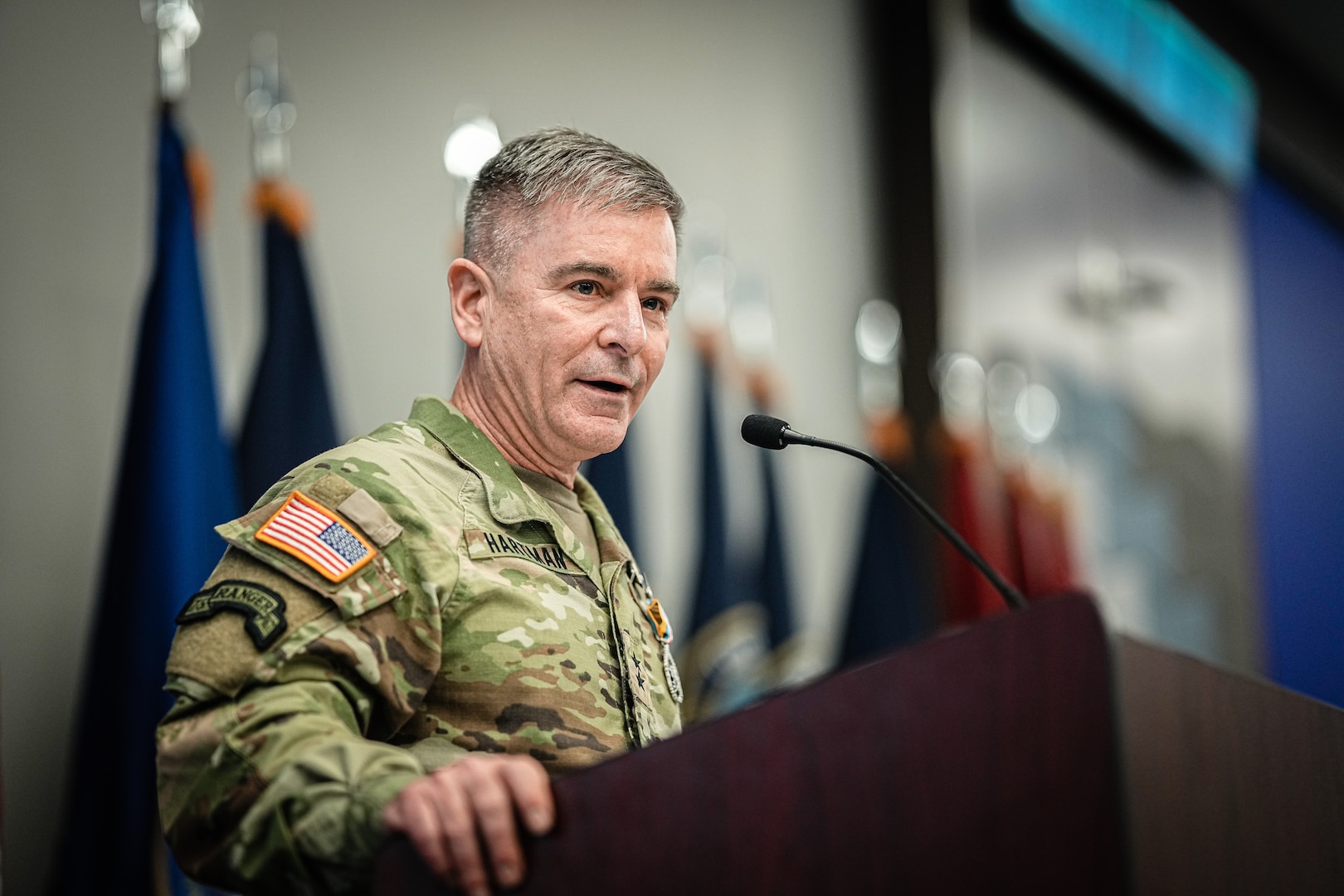 Maj. Gen. William J. Hartman, outgoing commander, Cyber National Mission Force, addresses the audience.