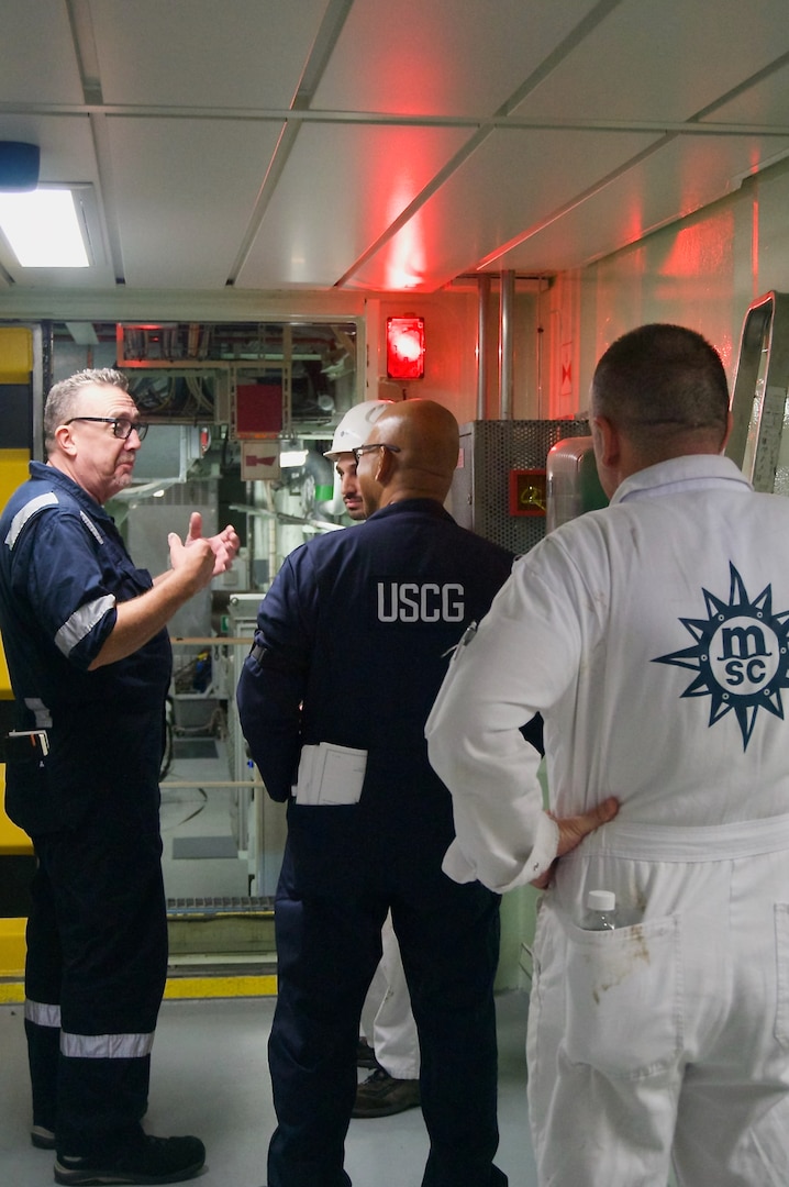 A team from U.S. Coast Guard Forces Micronesia/Sector Guam and the U.S. Coast Guard Cruise Ship National Center of Expertise inspect watertight doors during a Certificate of Compliance (COC) exam on the 1,036-foot Maltese-flagged cruise ship MSC Bellissima on its first-ever U.S. port call at the Port of Guam, on Jan. 3, 2024. The U.S. Coast Guard conducts COC exams for new or existing vessels that are embarking passengers from a U.S. port for the first time, carrying U.S. citizens as passengers with initial port calls at U.S. ports, or have undergone significant modifications or alterations, including changes that affect structural fire protection or means of egress, in order to ensure these vessels, meet required safety and regulatory standards. (U.S. Coast Guard photo by Josiah Moss)