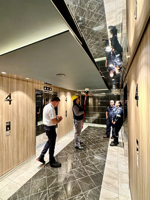 A team from U.S. Coast Guard Forces Micronesia/Sector Guam evaluate smoke detectors and alarms during a Certificate of Compliance (COC) exam on the 1,036-foot Maltese-flagged cruise ship MSC Bellissima on its first-ever U.S. port call at the Port of Guam, on Jan. 3, 2024. The U.S. Coast Guard conducts COC exams for new or existing vessels that are embarking passengers from a U.S. port for the first time, carrying U.S. citizens as passengers with initial port calls at U.S. ports, or have undergone significant modifications or alterations, including changes that affect structural fire protection or means of egress, in order to ensure these vessels, meet required safety and regulatory standards. (U.S. Coast Guard photo by Chief Warrant Officer Sara Muir)