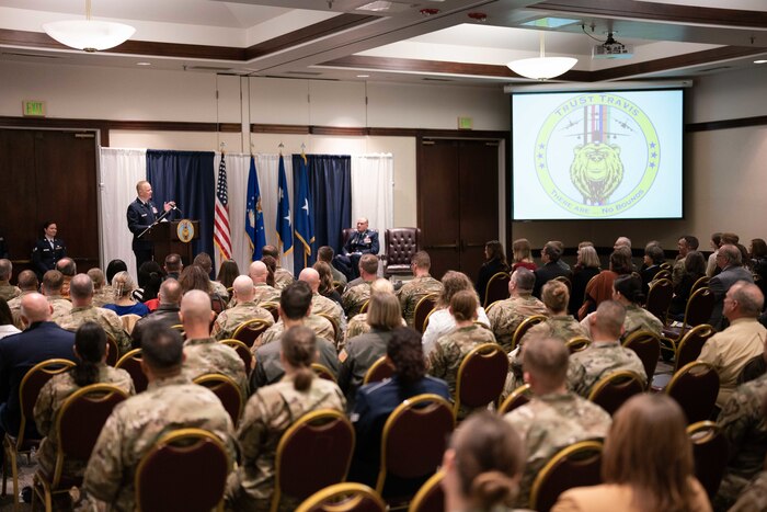 Salmi address audience during ceremony.