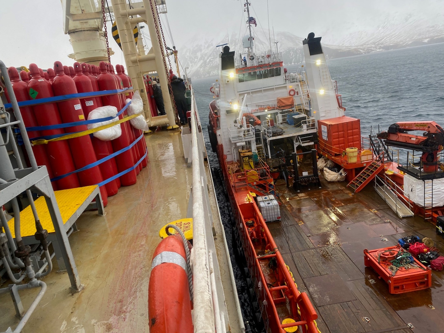 Response personnel successfully offloaded CO2 bottles from M/V Genius Star XI for inspection, refill, and reinstallation while anchored in Broad Bay, Alaska, Jan. 4, 2024. The bottles are part of the ship’s installed firefighting equipment that are required to meet Safety Of Life At Sea requirements established by the International Maritime Organization. Courtesy photo.