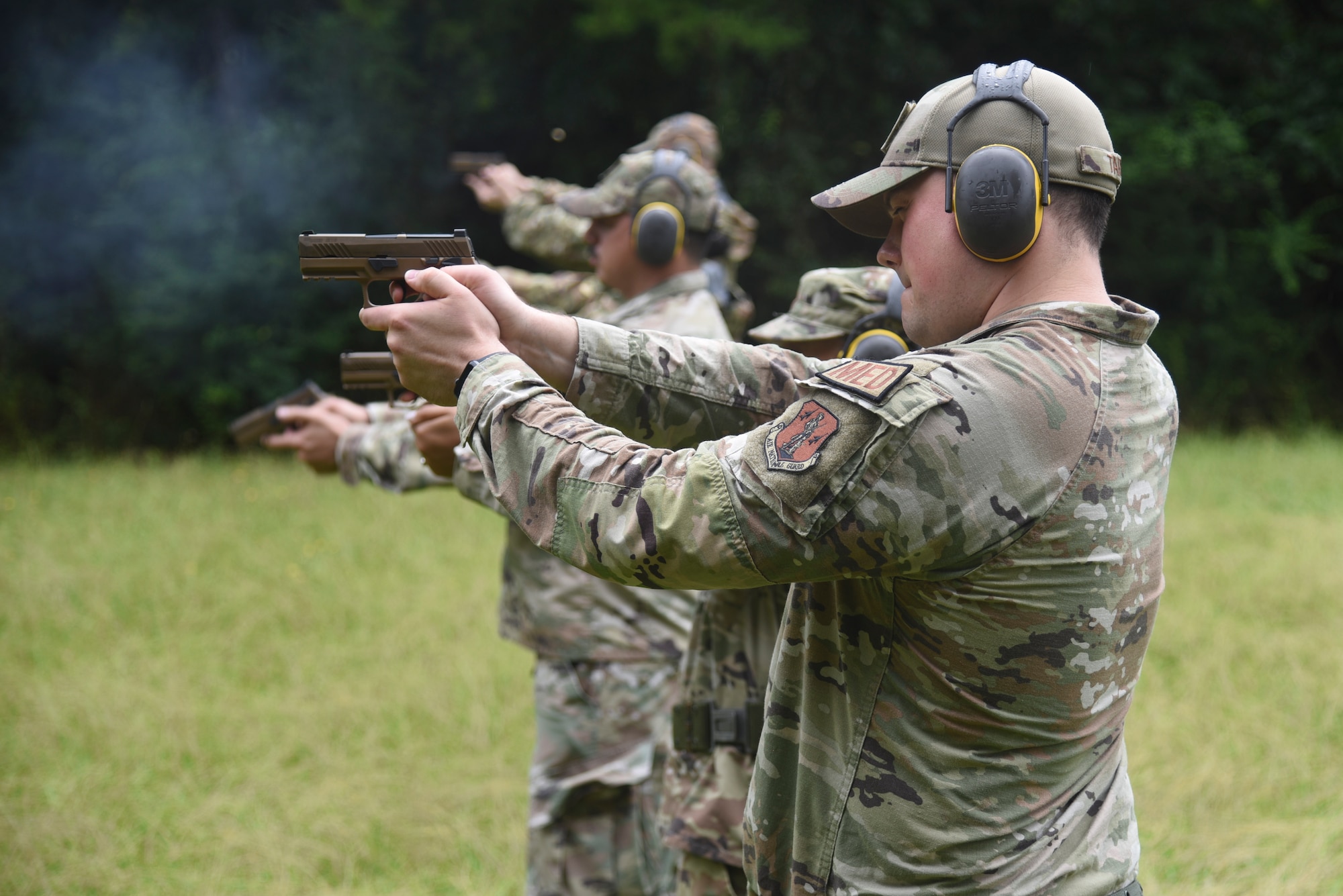 Members of the 117th Air Refueling Wing qualify on the M-18 handgun at the Magic City Gun Club in Birmingham, Alabama, August 4, 2023. The qualification consisted of two rounds of shooting from various distances. (U.S. Air National Guard photo by Staff Sgt Nicholas Faddis)