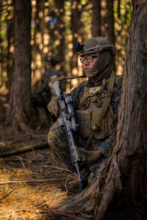 U.S. Marine Corps Lance Cpl. Orin Chacho provides security during Stand-in Force Exercise 24 at Combined Arms Training Center Camp Fuji, Japan, Dec. 4, 2023. SIFEX 24 is a division-level exercise involving all elements of the Marine Air-Ground Task Force focused on strengthening multi-domain awareness, maneuver, and fires across a distributed maritime environment. This exercise serves as a rehearsal for rapidly projecting combat power in defense of allies and partners in the region. Chacho, a native of Thoreau, New Mexico is a rifleman with 2d Battalion, 7th Marine Regiment. 2/7 is forward deployed in the Indo-Pacific under 4th Marine Regiment, 3d Marine Division as part of the Unit Deployment Program. (U.S. Marine Corps photo by Lance Cpl. Matthew Morales)