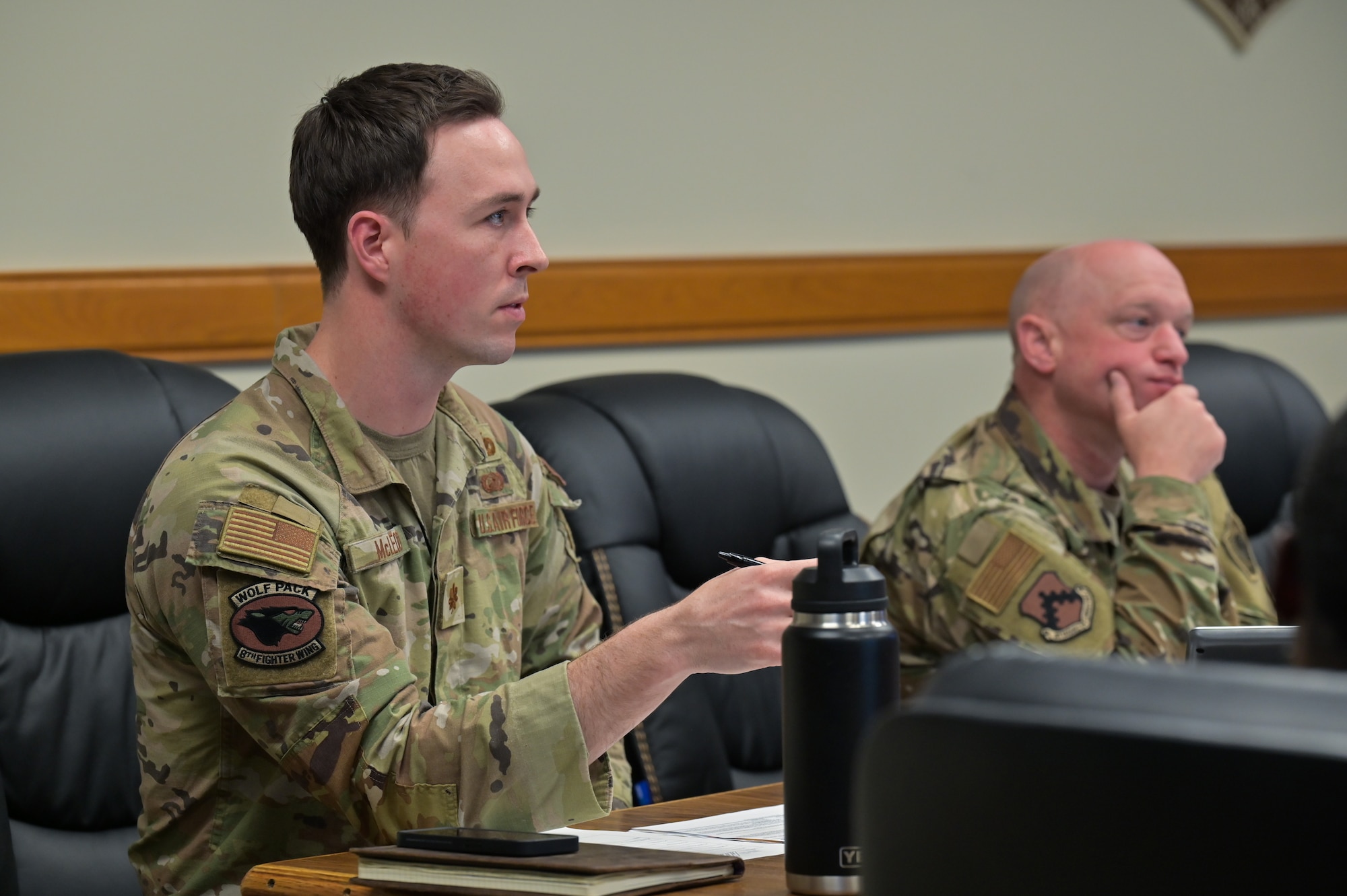8th FW leaders discuss the details of a plan presented during a Wolfwerx event at Kunsan Air Base
