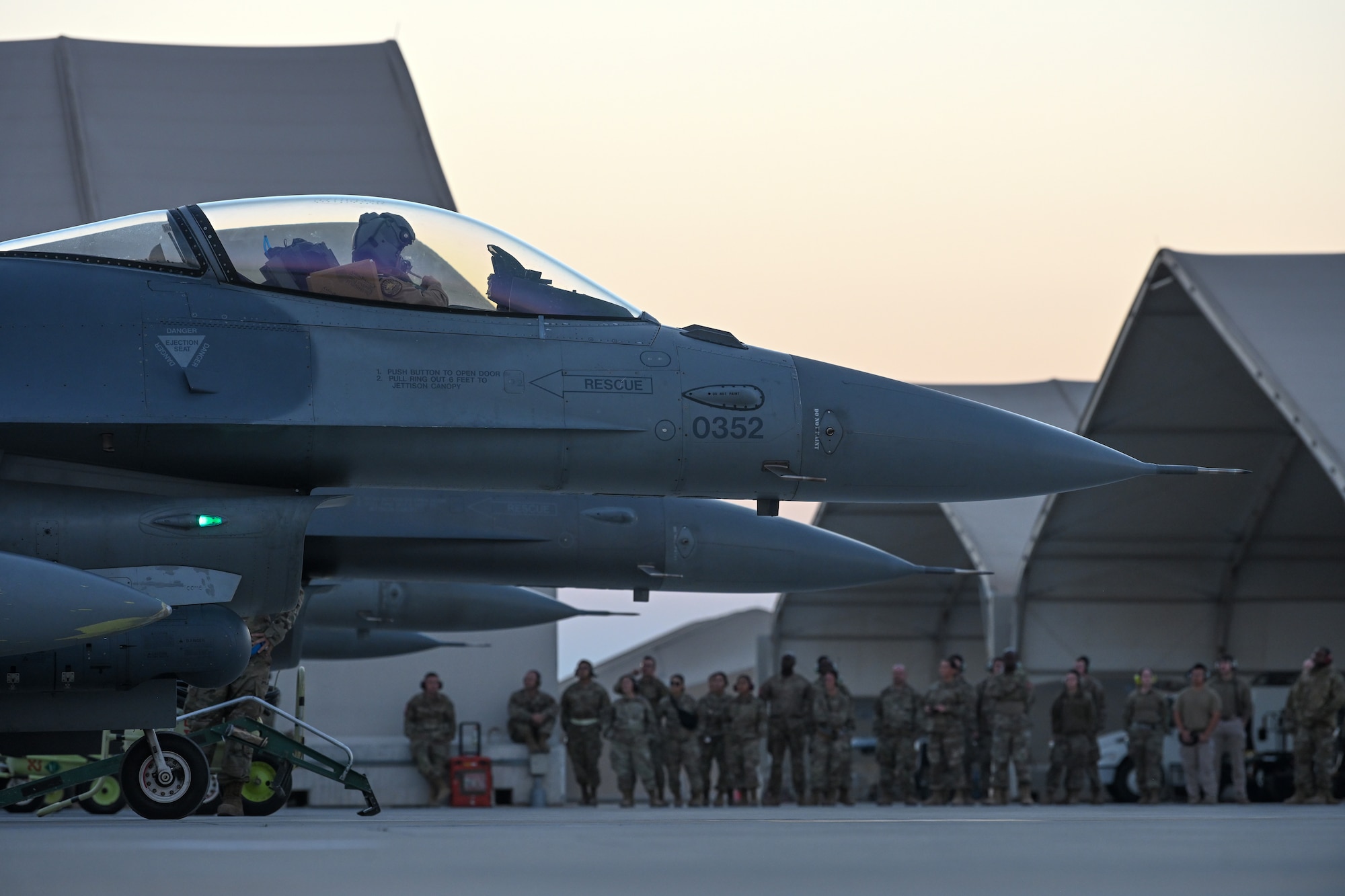 A U.S. Air Force F-16 Fighting Falcon goes through final checks following the arrival at an undisclosed location in the U.S. Central Command area of responsibility in preparation for Exercise Ballast Cannon, Jan. 6, 2024.