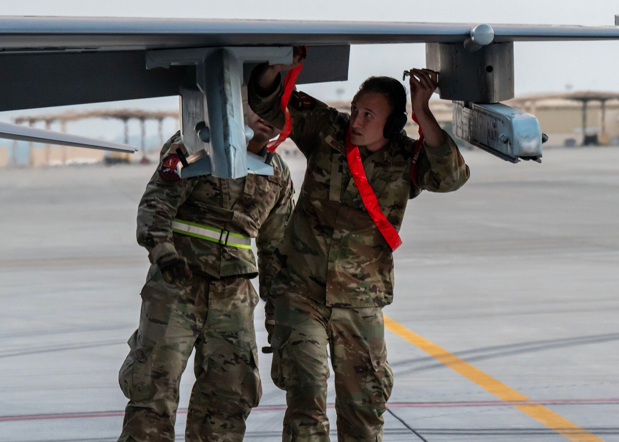U.S. Air Force Staff Sgt. Matthew Norcross, an F-16 crew chief, inspects a U.S. Air Force F-16 Fighting Falcon at an undisclosed location in the U.S. Central Command area of responsibility as part of Exercise Ballast Cannon Jan. 6, 2024.