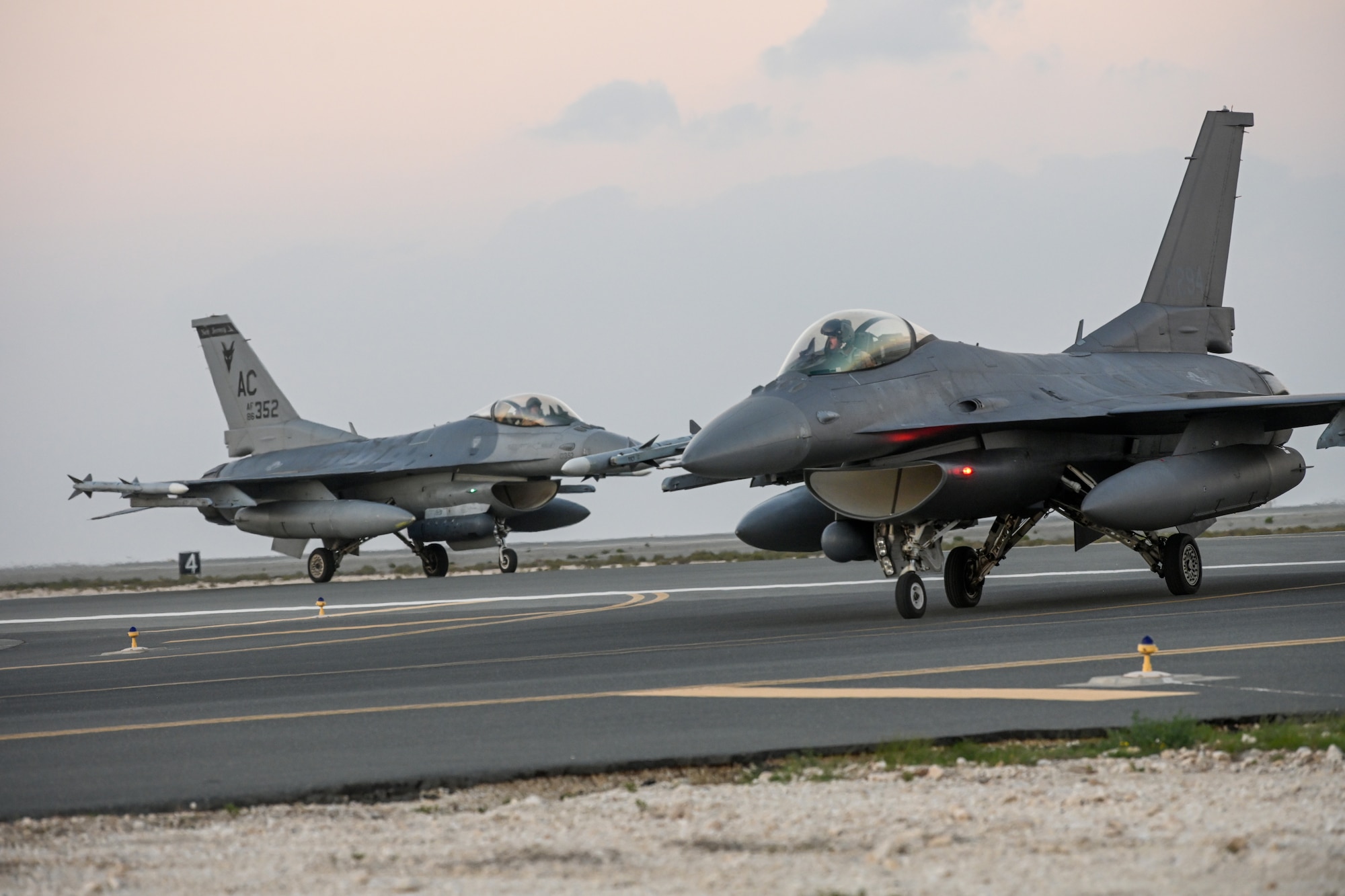 U.S. Air Force F-16 Fighting Falcons taxi at an undisclosed location in the U.S. Central Command area of responsibility in preparation for combined Exercise Ballast Cannon, Jan. 6, 2024.