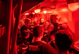 USS Mason (DDG 87) small craft action team discuss assignments supporting Operation Prosperity Guardian in the Red Sea.