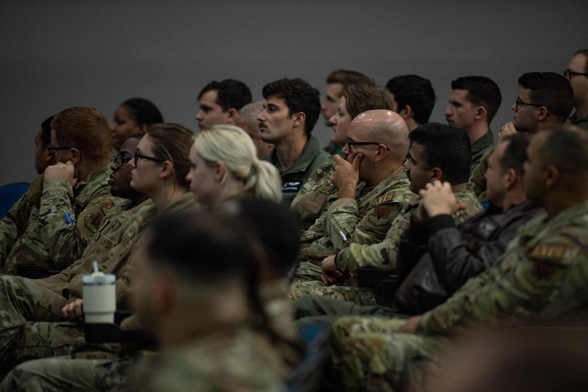 U.S. Air Force Airmen listen to the 23rd Wing command team speak at an all call at Moody Air Force Base, Georgia, Jan. 3, 2024. Both Geers and Sheets gave Airmen in the audience an opportunity to ask questions about personal goals and the future of Team Moody. (U.S. Air Force photo by Airman 1st Class Whitney Gillespie)