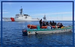 Boarding officers in an interceptor boat from the U.S. Coast Guard Cutter Stratton take suspected smugglers into custody during the boarding of a suspected smuggling vessel in international waters in the drug transit zone of the Eastern Pacific Ocean, Feb. 23, 2017. The Stratton seized a total of 3,700 pounds of cocaine during their counter-smuggling patrol. (U.S. Coast Guard photo by Petty Officer 1st Class Mark Barney)