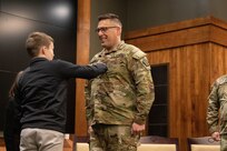 The Illinois Army National Guard’s staff officer in the Illinois Army National Guard Headquarters’ Plans, Operations, and Training Directorate (G3), Nicholas Krzensinki, was promoted to lieutenant colonel during a ceremony at the Illinois Military Academy on Camp Lincoln in Springfield on Jan. 4.