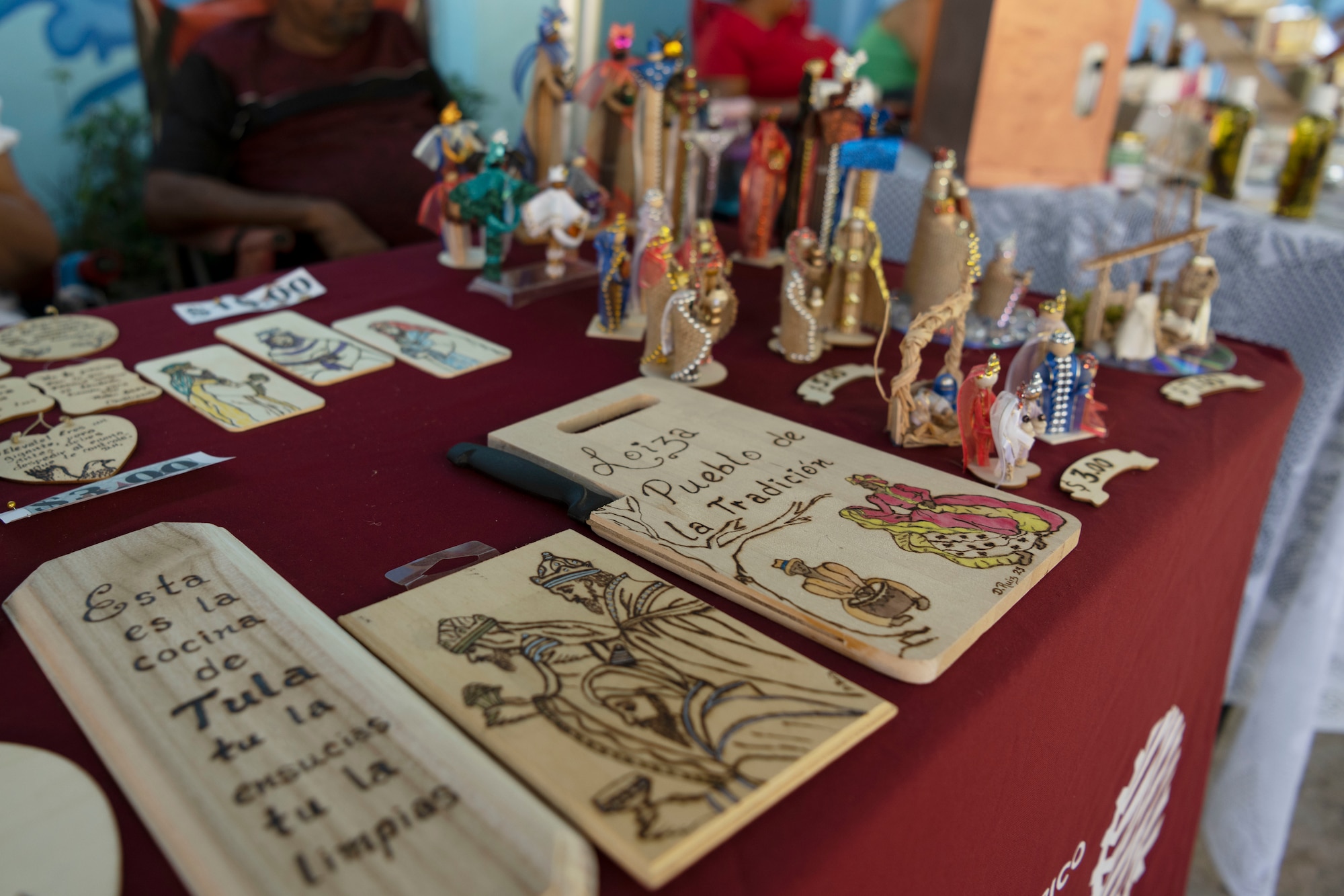 A detailed shot of local handicrafts exhibited in a Three Kings eve event at Loiza, Puerto Rico, Jan. 5, 2024. For 48 consecutive years, the Puerto Rico Air National Guard has honored a Puerto Rican tradition, Three Kings Day, by impacting the Piñones community through a yearly event where the 156th Wing Chiefs Council and U.S. Airmen partnered with local non-profit organizations to impact hundreds of children with ages ranging from newborn to 12-years-old, during the eve of Three Kings Day. (U.S. Air National Guard photo by Airman 1st Class Sharymel Montalvo Velez)