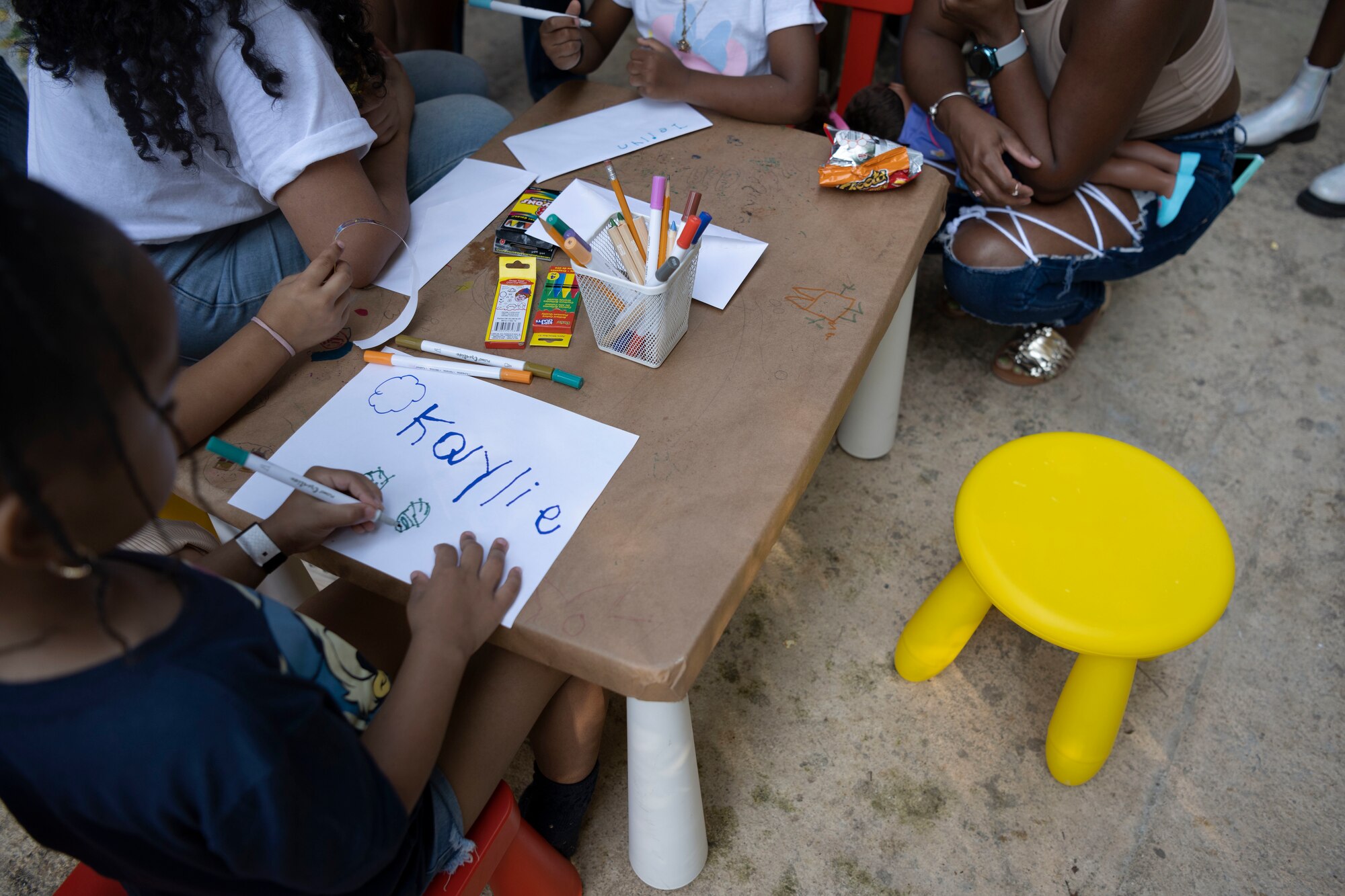 Children participate in a drawing and letter-writing workshop in a Three Kings Eve event at Loiza, Puerto Rico, on Jan. 5, 2024. For 48 consecutive years, the Puerto Rico Air National Guard has honored a Puerto Rican tradition, Three Kings Day, by impacting the Piñones community through a yearly event where the 156th Wing Chiefs Council and U.S. Airmen partnered with local non-profit organizations to impact hundreds of children with ages ranging from newborn to 12-years-old, during the eve of Three Kings Day. (U.S. Air National Guard photo by Airman 1st Class Sharymel Montalvo Velez)