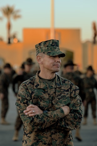 Sgt. Maj. Carlos Ruiz, the 20th Sergeant Major of the Marine Corps, poses with Marines from the Recruit Training Regiment at Marine Corps Recruit Depot San Diego, Dec. 5, 2023. Ruiz visited the Depot to listen to the ideas, questions, and concerns of Marines throughout the installation on how to improve the Marine Corps and recruiting mission. (U.S. Marine Corps photo by Lance Cpl. Sarah M. Grawcock)