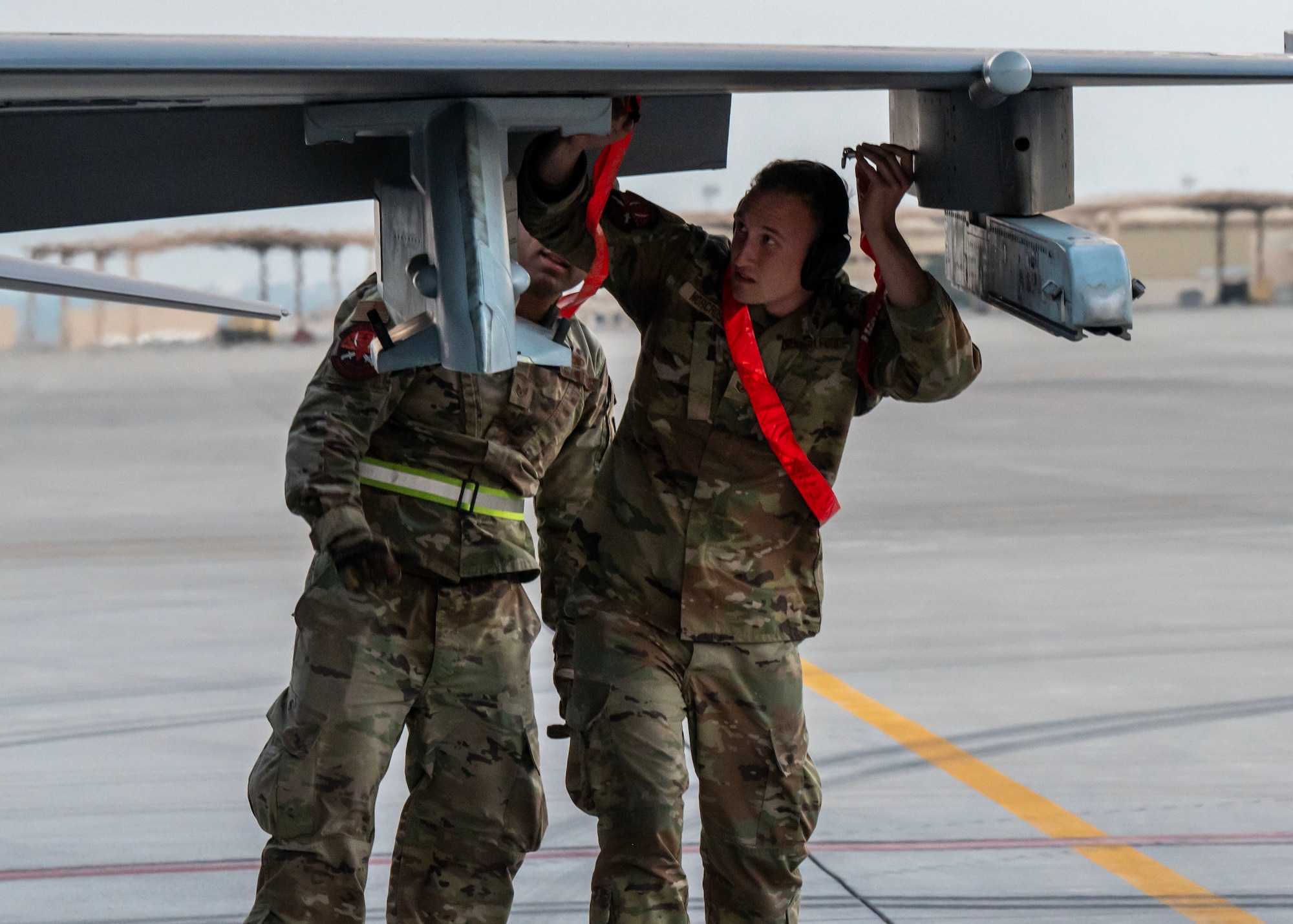 U.S. Air Force Staff Sgt. Matthew Norcross, an F-16 crew chief, inspects a U.S. Air Force F-16 Fighting Falcon at an undisclosed location in the U.S. Central Command area of responsibility as part of Exercise Ballast Cannon Jan. 6, 2024.