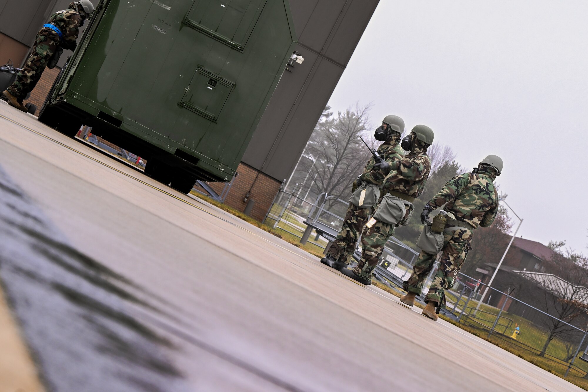 Reserve Citizen Airmen assigned to the 910th Airlift Wing prepare to offload cargo from a C-130H Hercules aircraft during a Chemical, Biological, Radiological, Nuclear and high-yield Explosives response exercise at Youngstown Air Reserve Station, Ohio, Dec. 3, 2023.