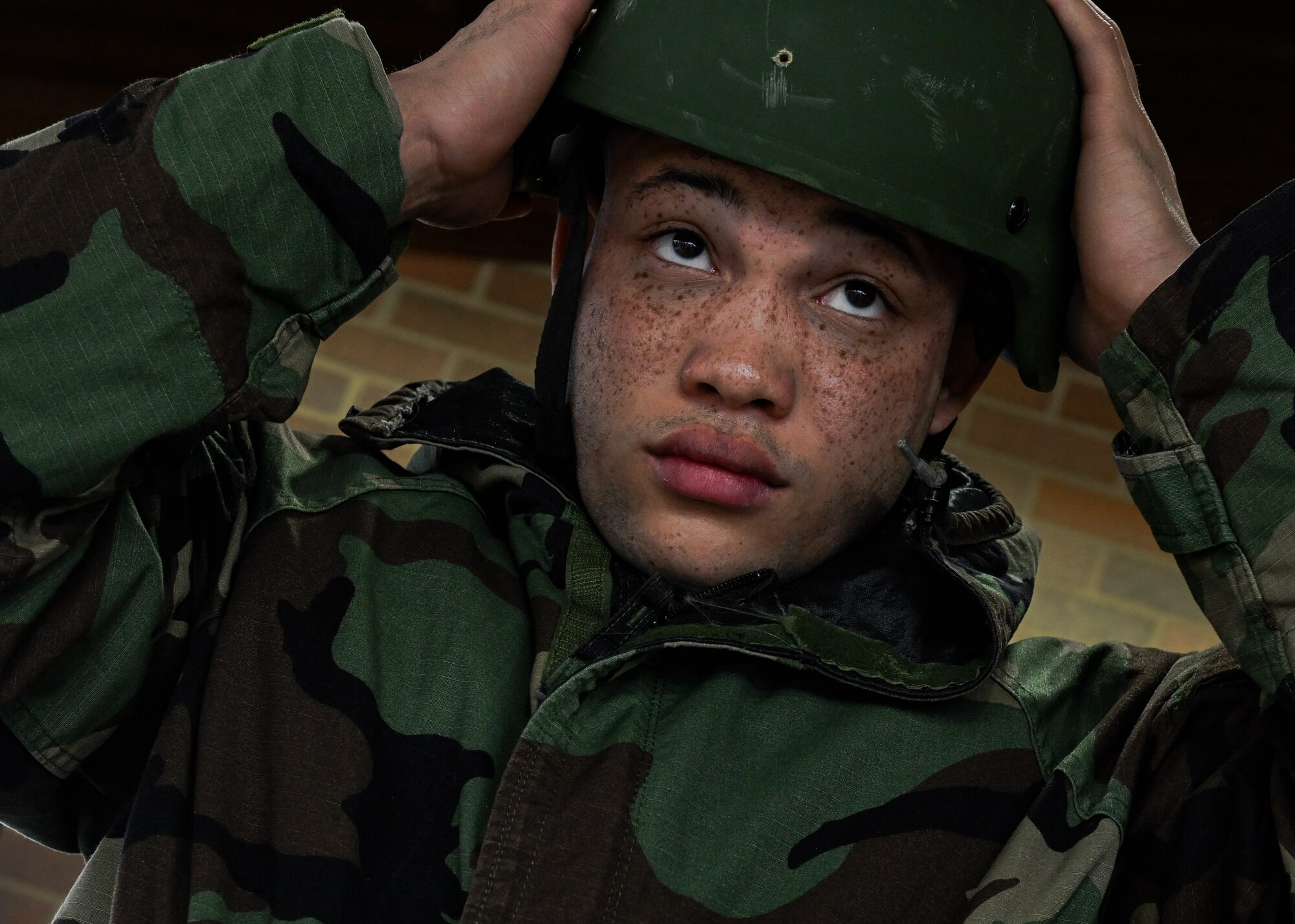 A Reserve Citizen Airman assigned to the 910th Medical Squadron removes personal protective equipment during a Chemical, Biological, Radiological, Nuclear and high-yield Explosives response exercise at Youngstown Air Reserve Station, Ohio, Dec. 3, 2023.