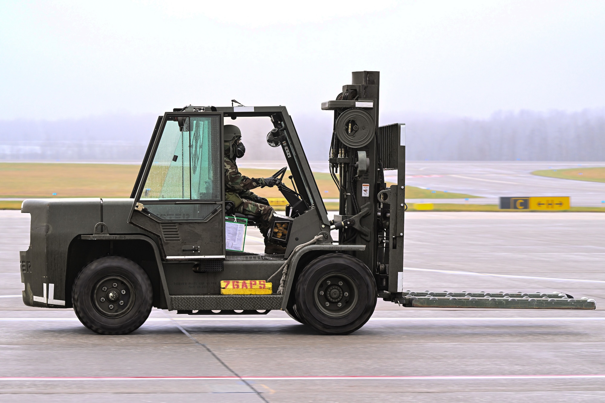 A Reserve Citizen Airman assigned to the 910th Aerial Port Squadron operates a forklift during a Chemical, Biological, Radiological, Nuclear and high-yield Explosives response exercise at Youngstown Air Reserve Station, Ohio, Dec. 3, 2023.